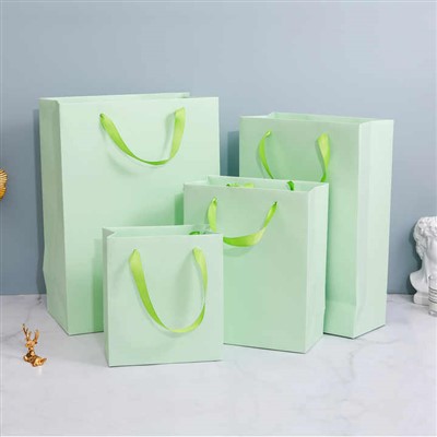 Gelamineerde cadeauzakken